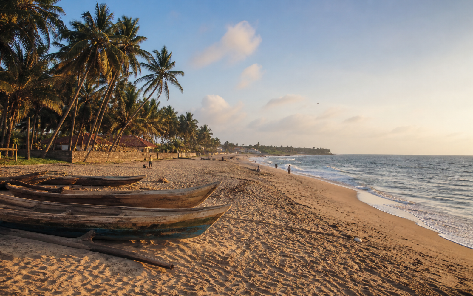 Palm-lined Atlantic beach and fishing boats near Keta in Ghana's Volta Region